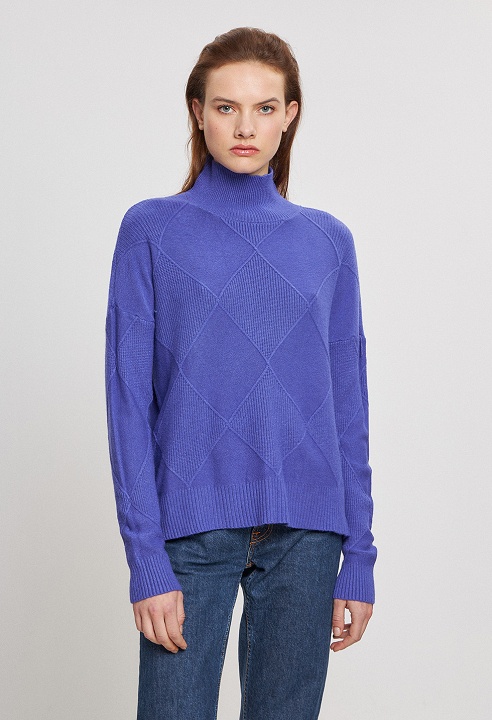 Knitted blouse with weaving pattern
