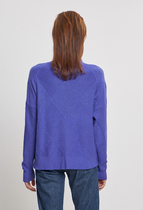 Knitted blouse with weaving pattern