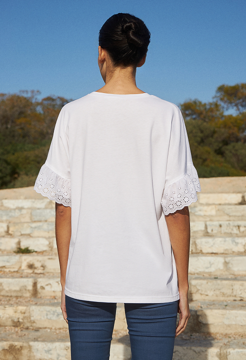 Blouse with embroidery and ruffles