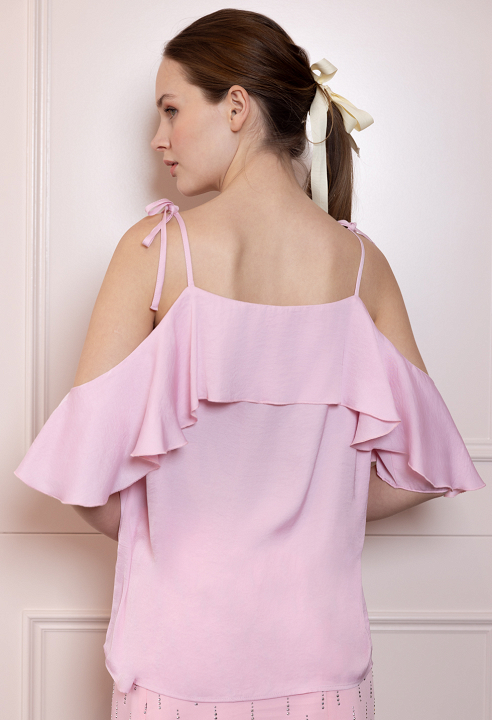 Blouse with ruffles and straps