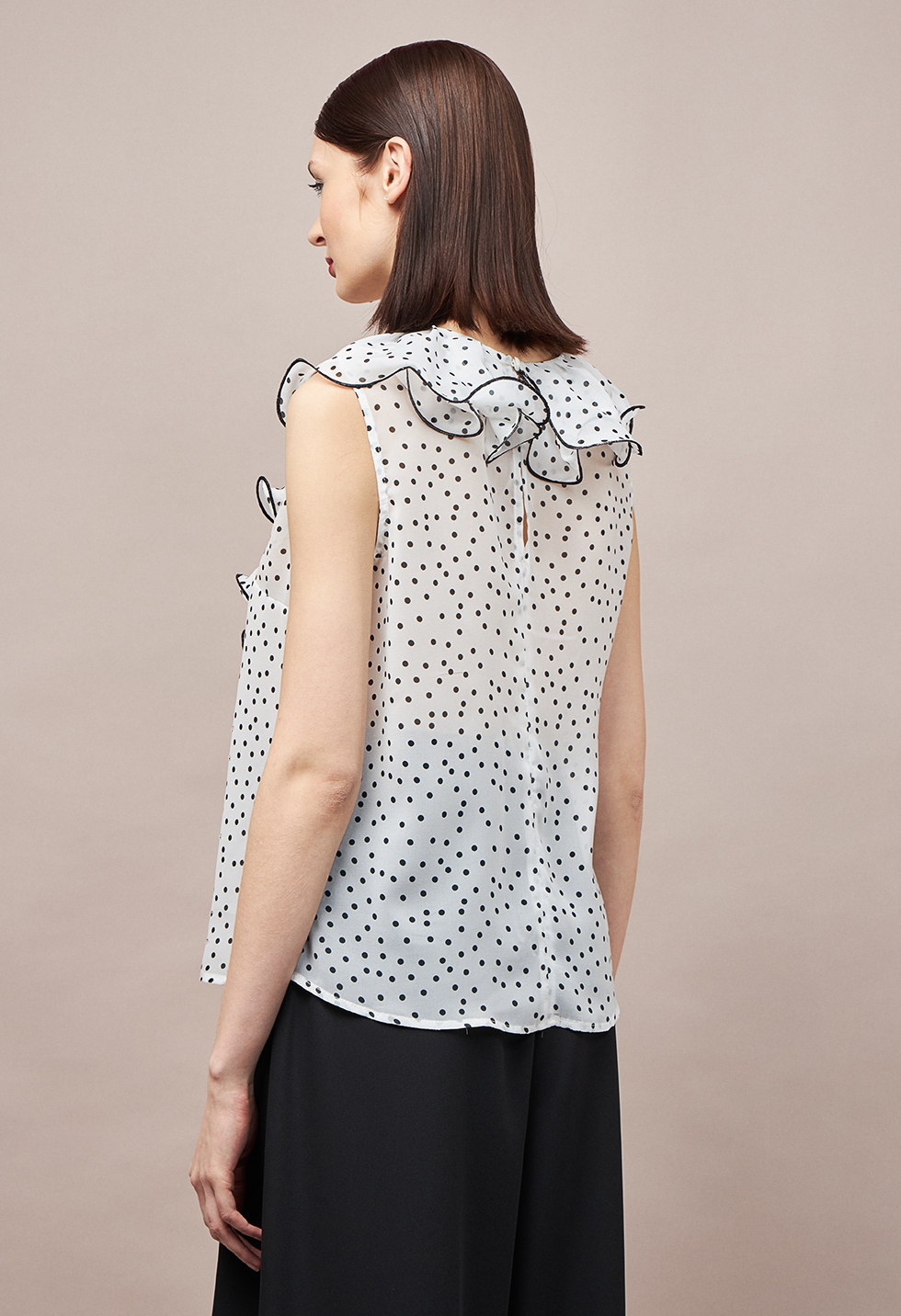 Polka dot blouse with ruffles