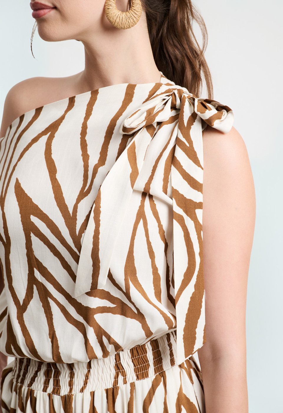 Zebra print jumpsuit with tie shoulder straps