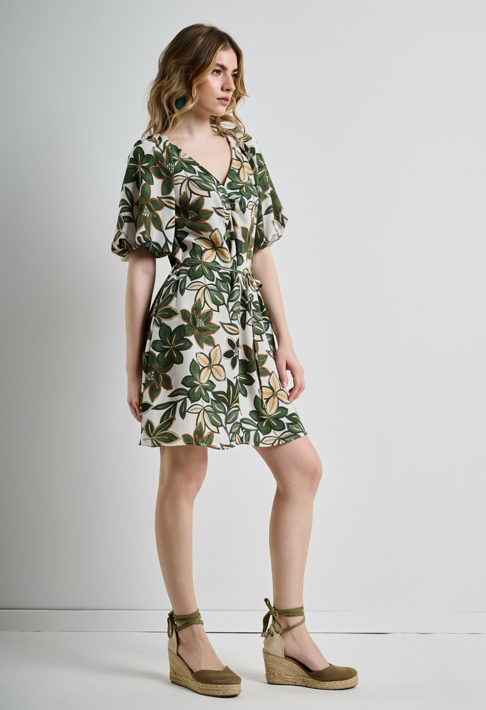 Short dress with a floral pattern.