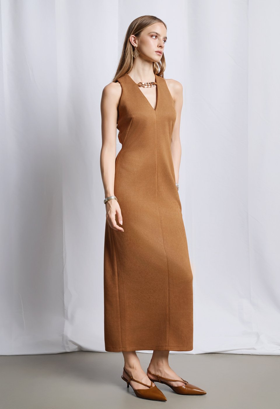 Long sleeveless suede dress