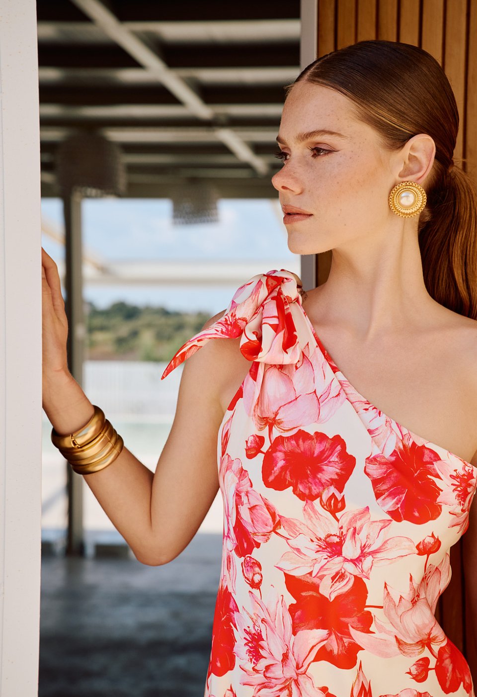 Floral one-shoulder maxi dress with a bow