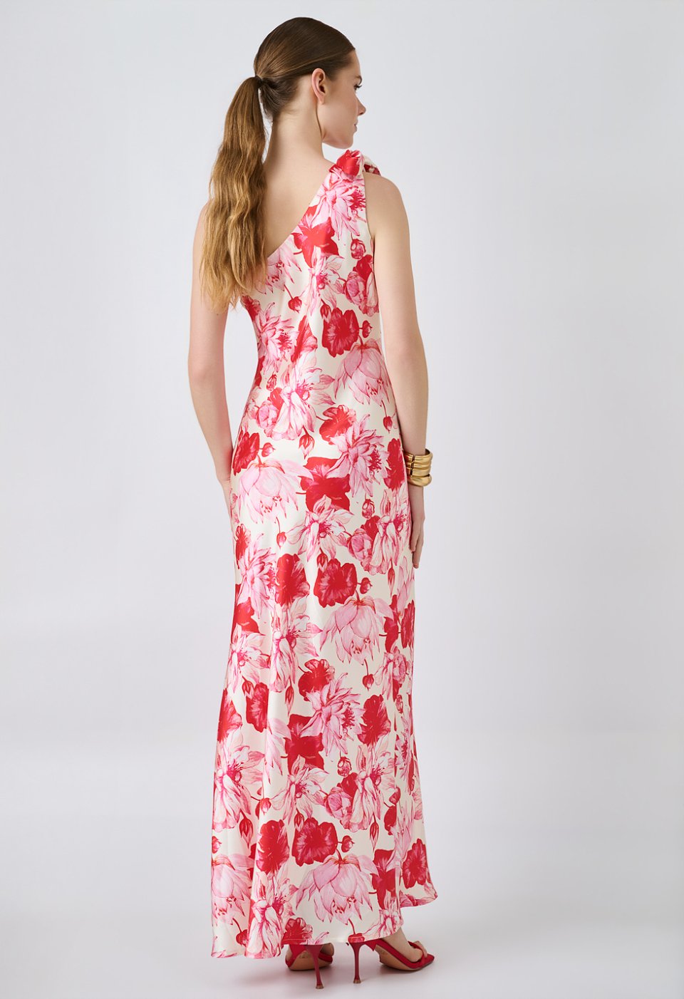 Floral one-shoulder maxi dress with a bow