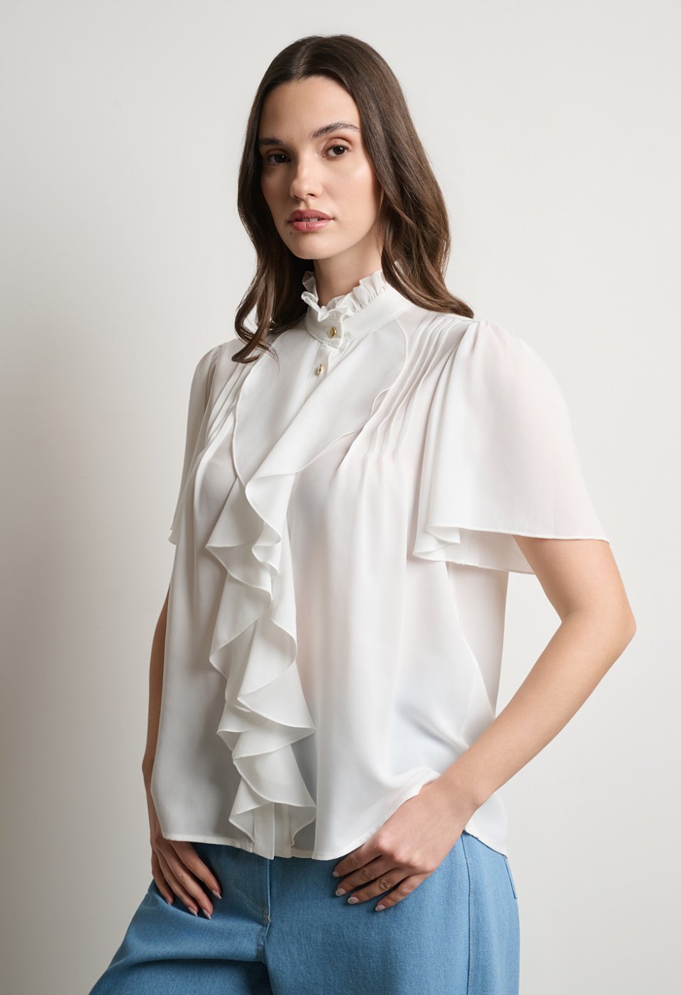 Blouse with ruffle detail and short sleeves