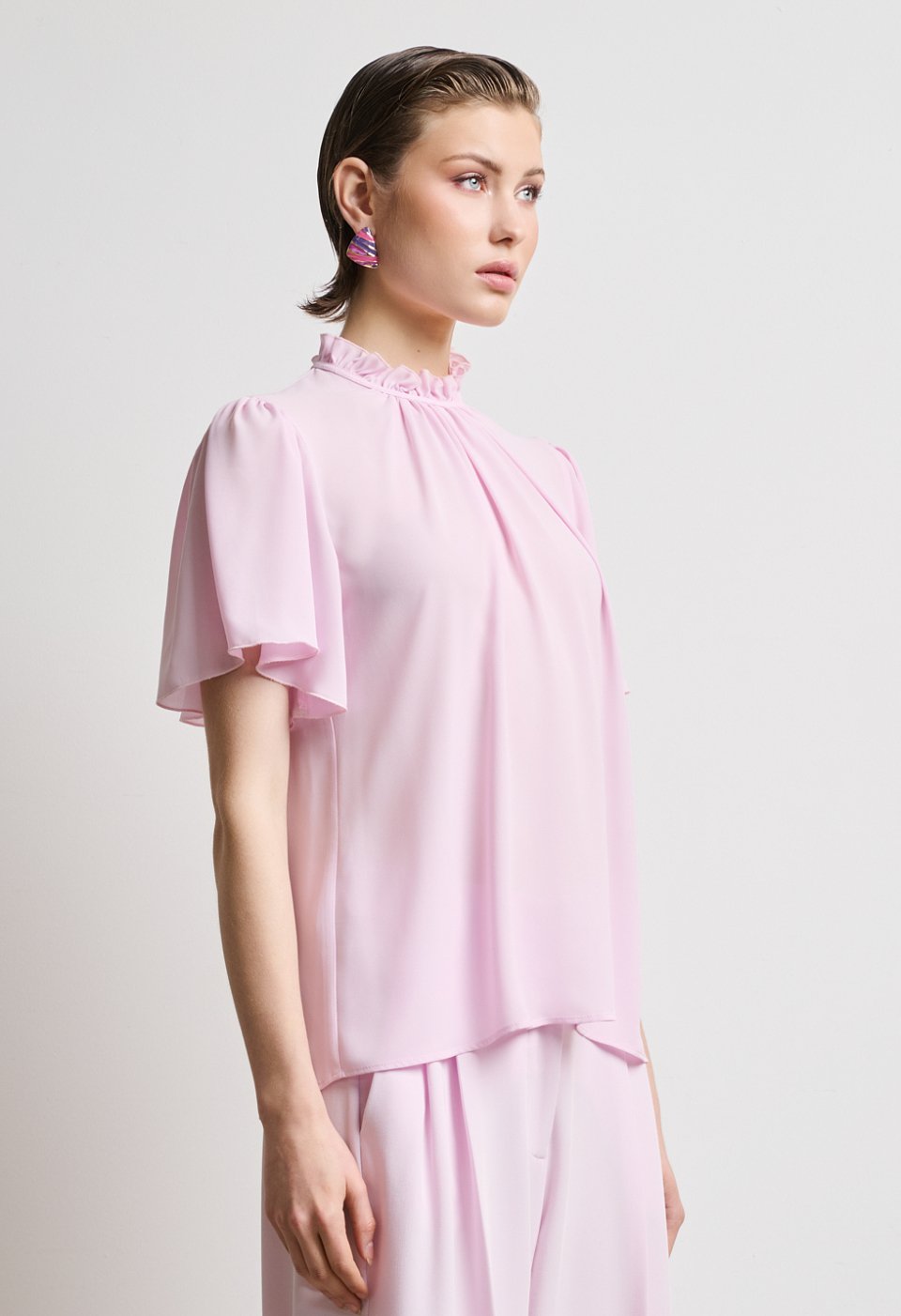 Blouse with ruffles and short sleeves