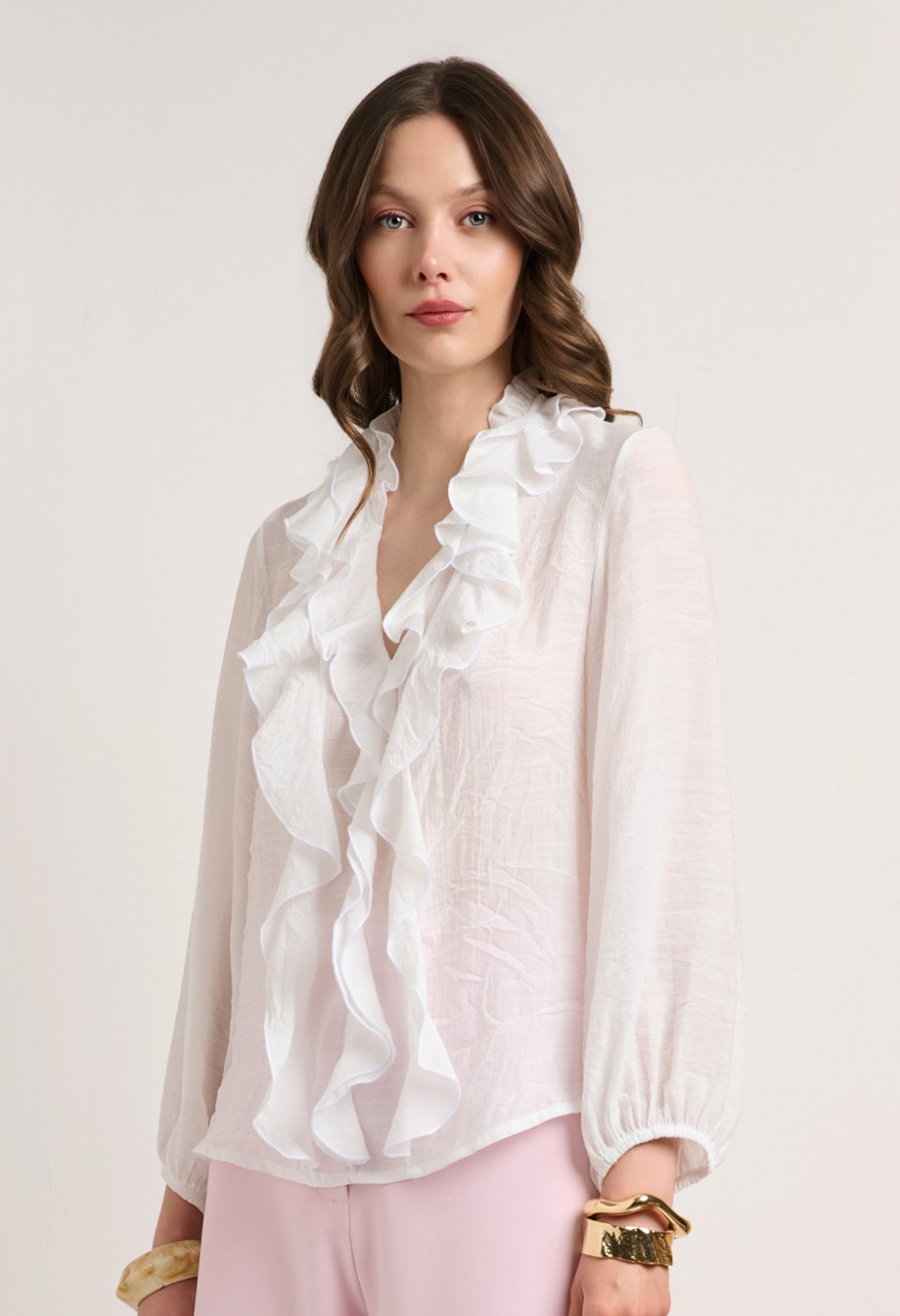 Blouse with ruffles and a V-neckline