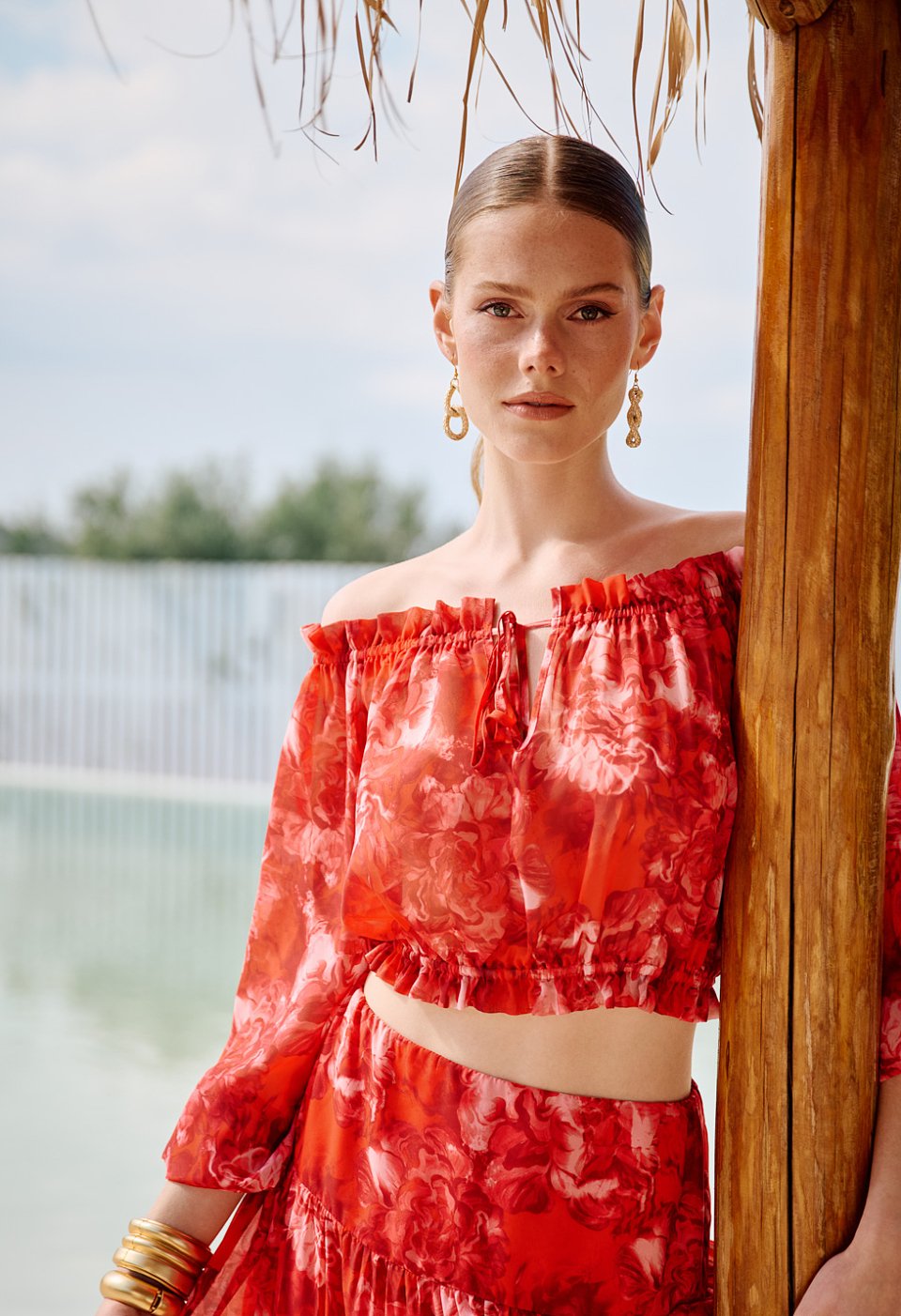 Floral off-shoulder crop top with long sleeves
