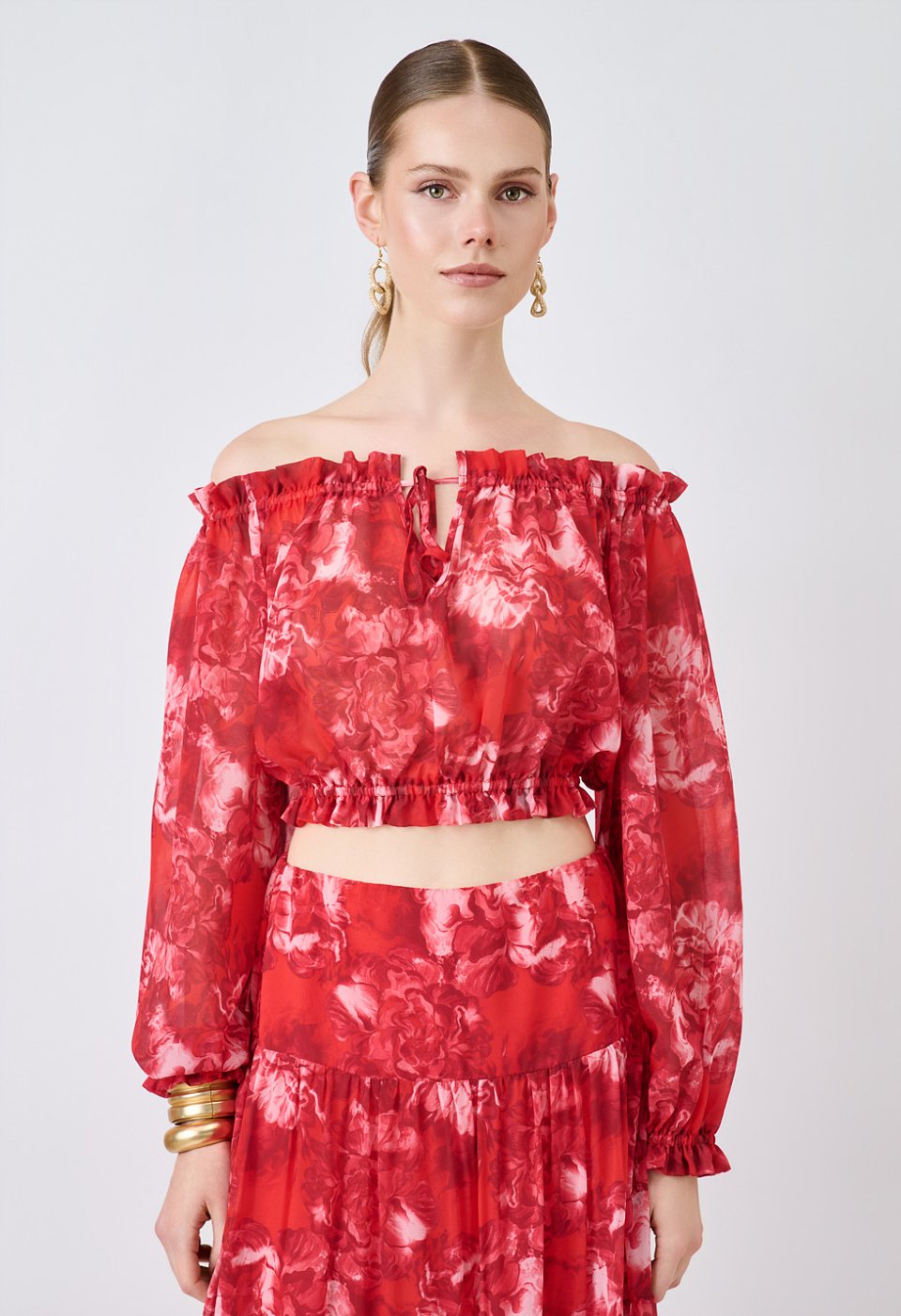 Floral off-shoulder crop top with long sleeves