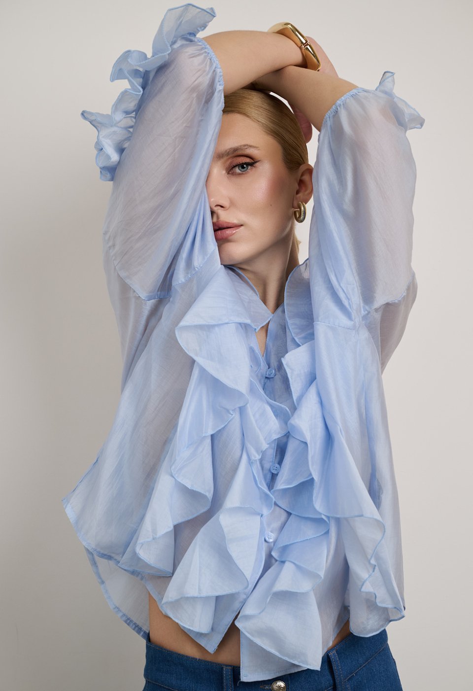 Blouse with ruffles and front buttons