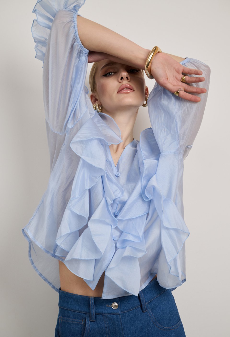 Blouse with ruffles and front buttons
