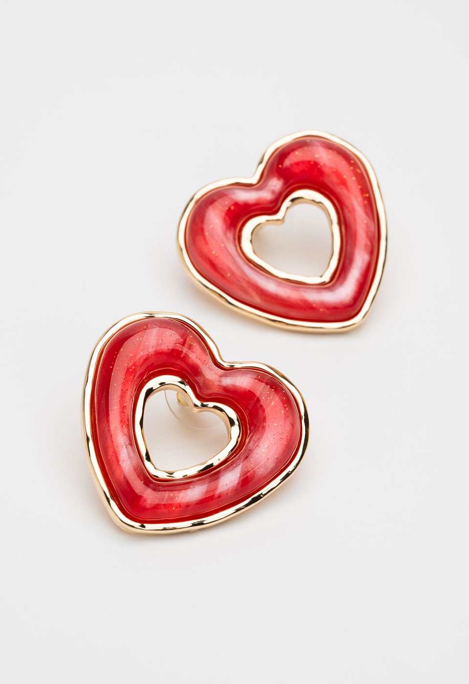 Red heart earrings with gold outline