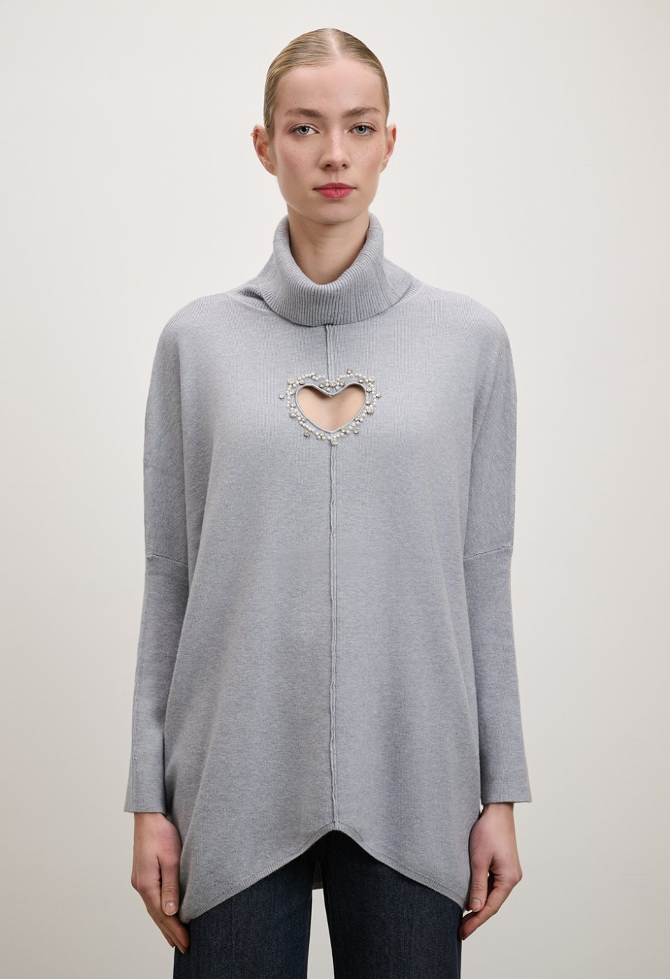 Turtleneck with a heart-shaped opening and rhinestone details