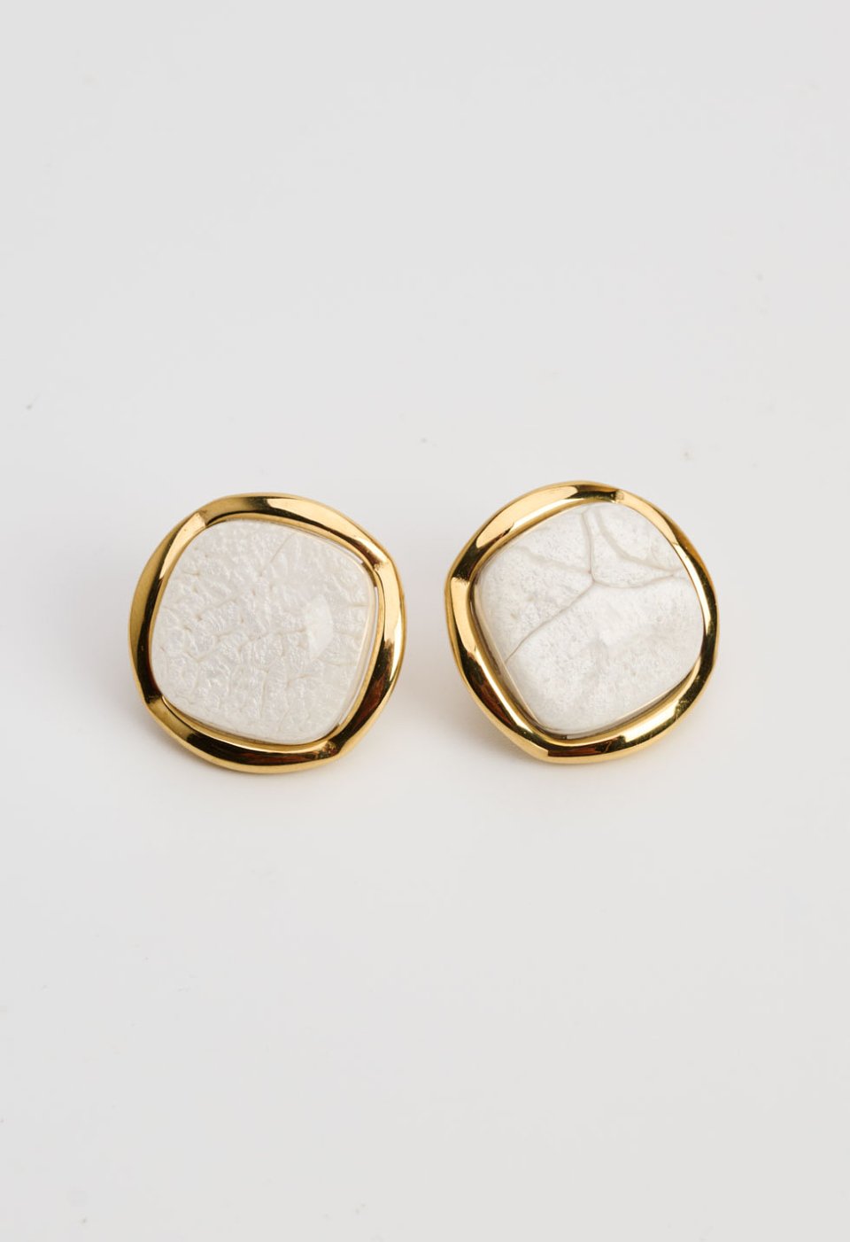 Gold earrings with white marble stone