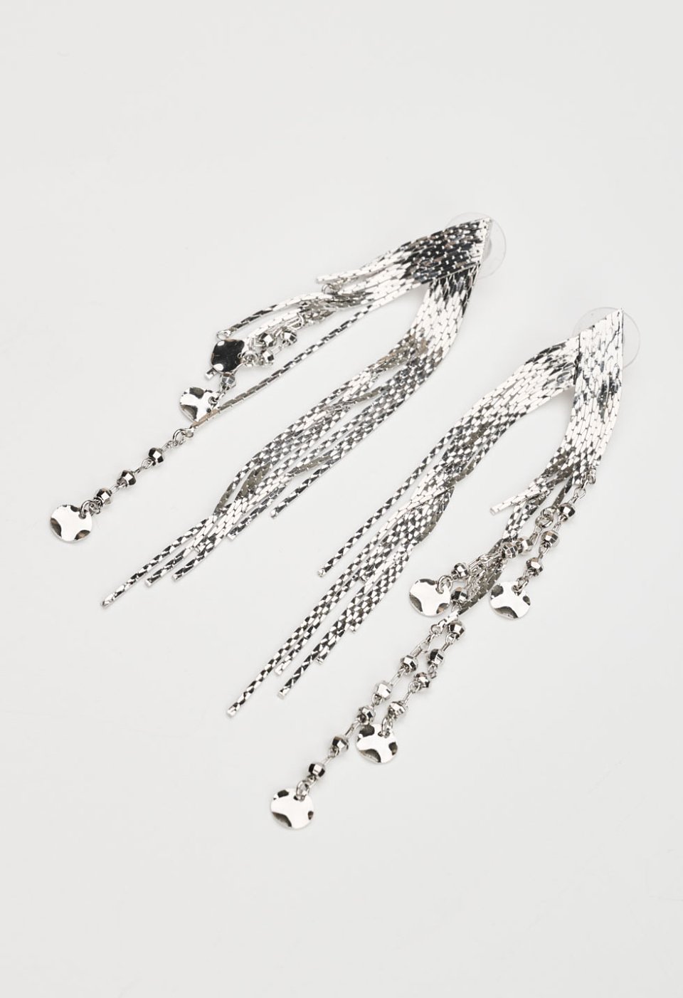 Long earrings with chains and hammered details