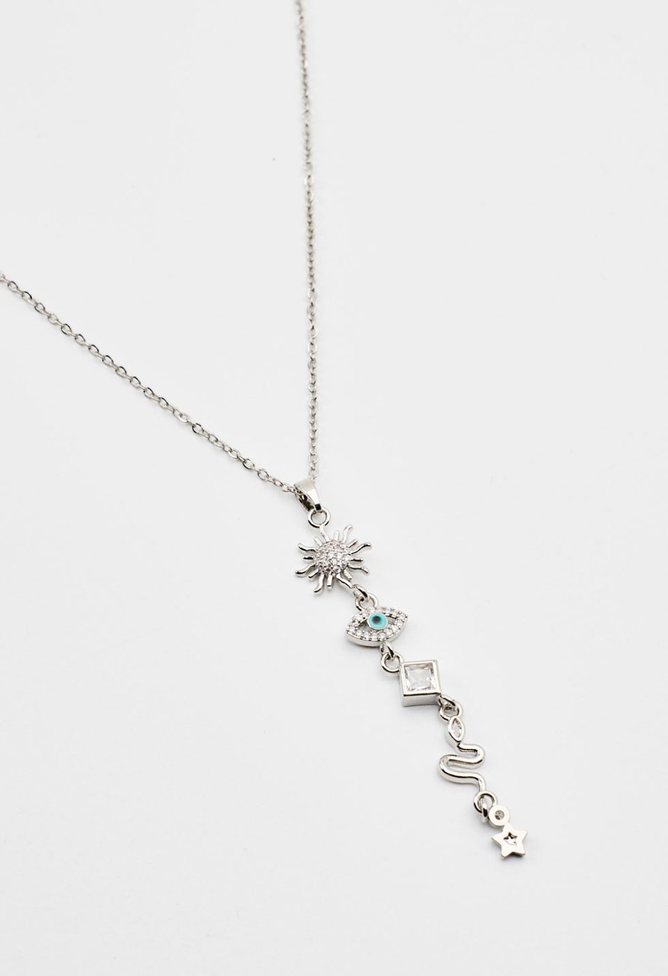 Necklace with dangling motifs and crystal details