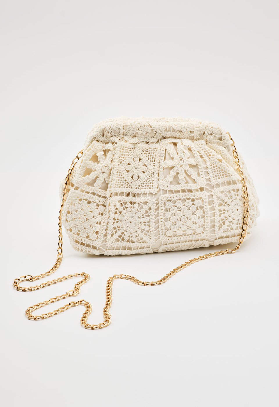 Pouch with crocheted lace design