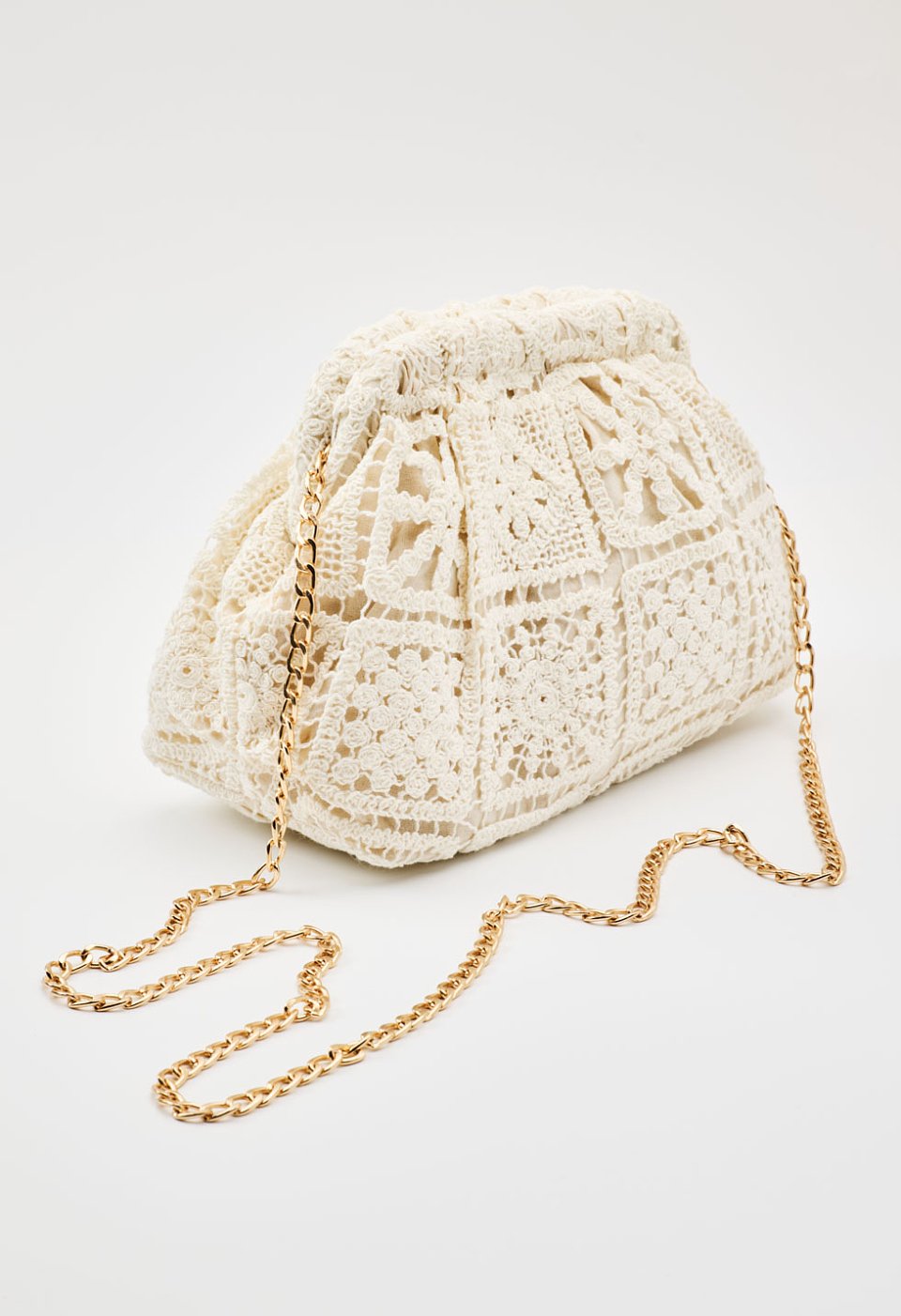 Pouch with crocheted lace design