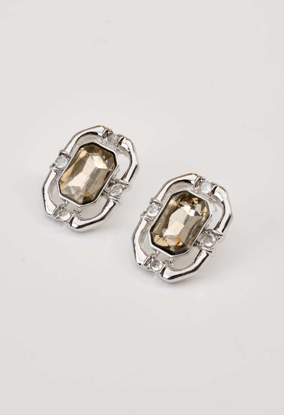 Earrings featuring a rectangular resin stone
