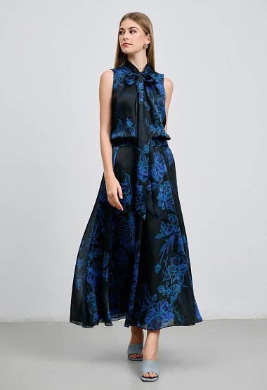 Sleeveless blouse with bow and floral print