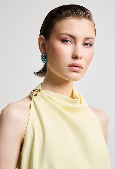 Halter blouse with decorative ring