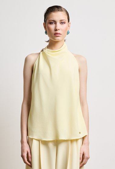 Halter blouse with decorative ring