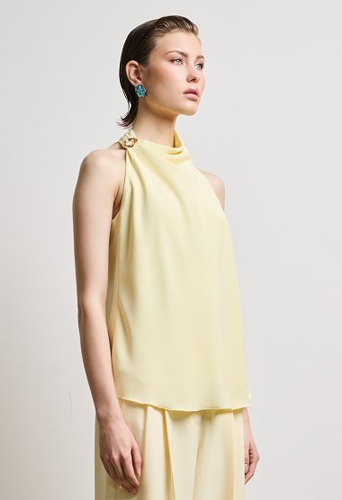Halter blouse with decorative ring