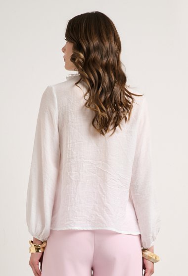 Blouse with ruffles and a V-neckline