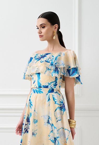 Floral top με βολάν και έξω ώμους