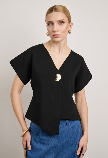Knit cardigan with decorative fastening