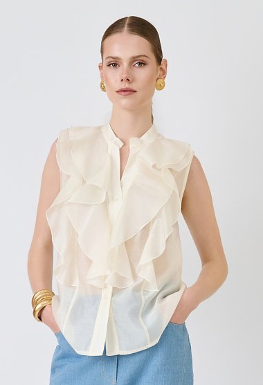 Sleeveless shirt with ruffles