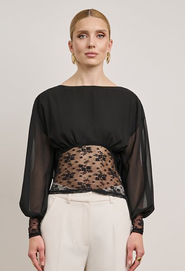 Lace blouse with a sheer back