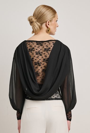 Lace blouse with a sheer back