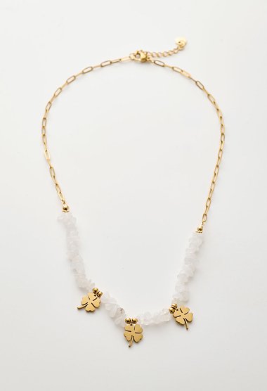 Gold-plated necklace with white beads and a clover motif