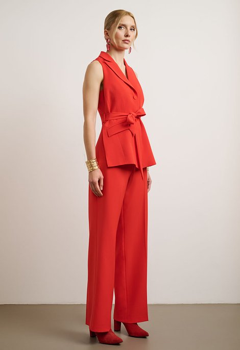 Sleeveless jumpsuit with front buttons and belt