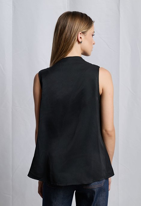 Sleeveless blouse with draped neckline