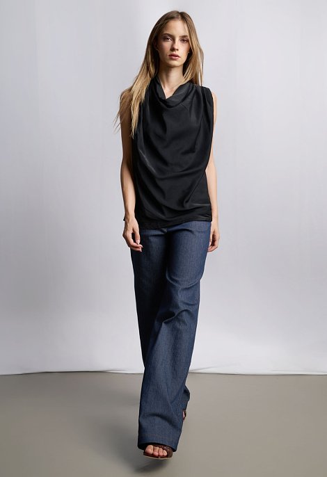 Sleeveless blouse with draped neckline