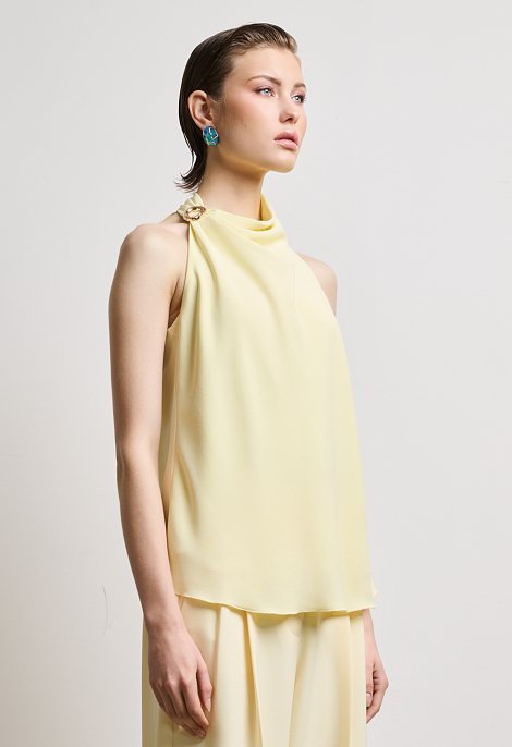 Halter blouse with decorative ring