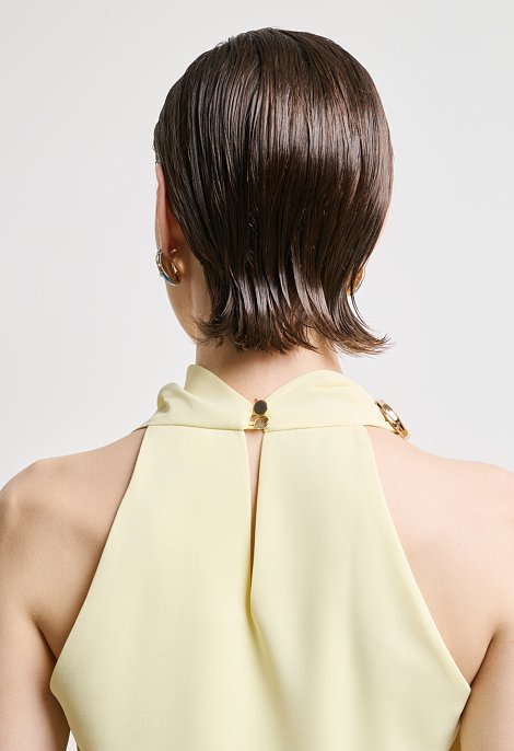 Halter blouse with decorative ring