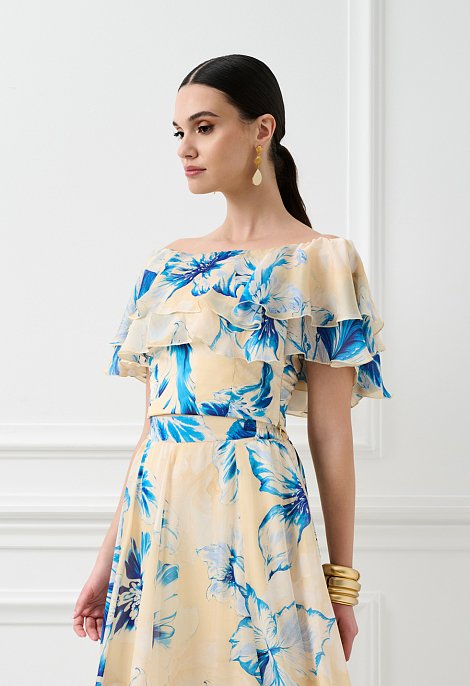 Floral top με βολάν και έξω ώμους