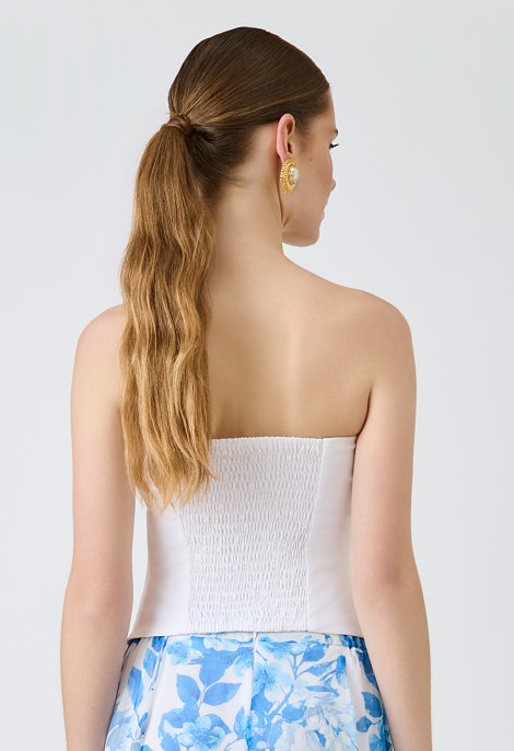 Strapless top with a smocked back