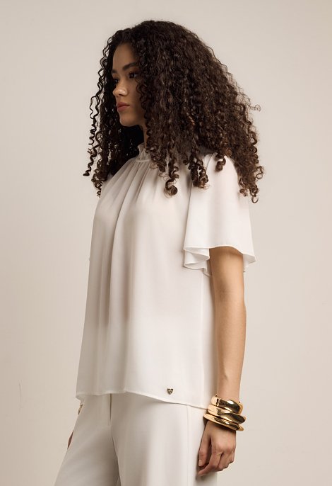 Blouse with ruffles and short sleeves