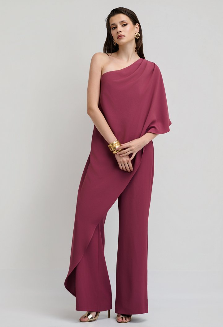 Βραδινό jumpsuit με ασύμμετρη κάπα