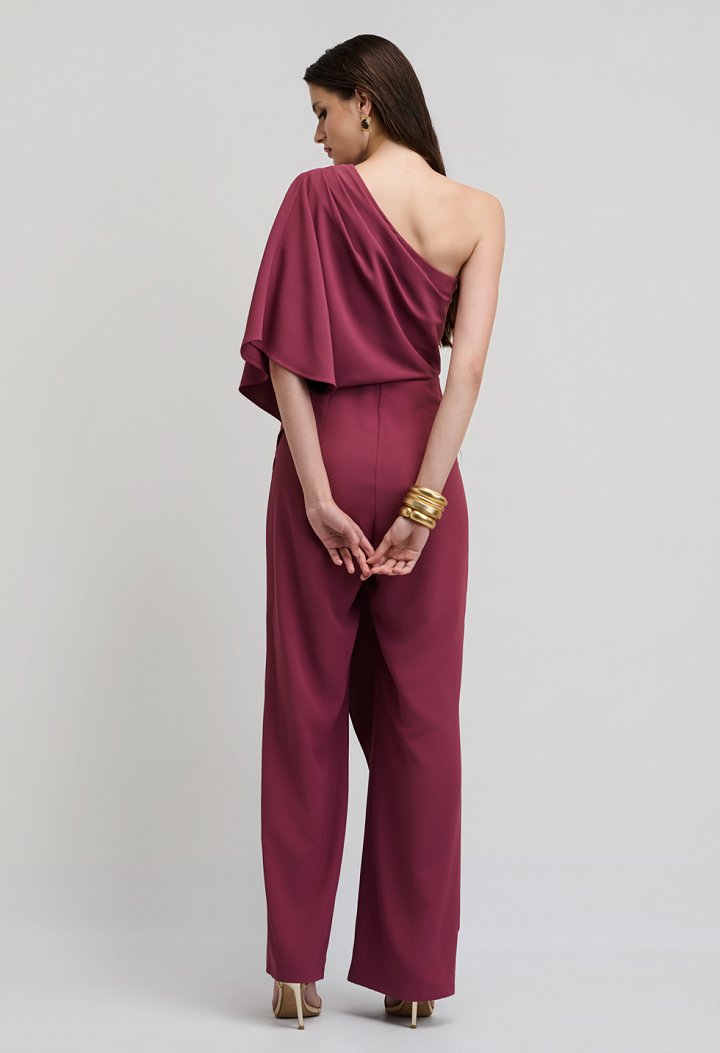 Βραδινό jumpsuit με ασύμμετρη κάπα