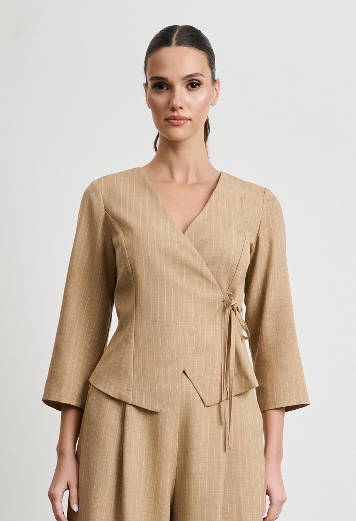 Beige top and trousers set