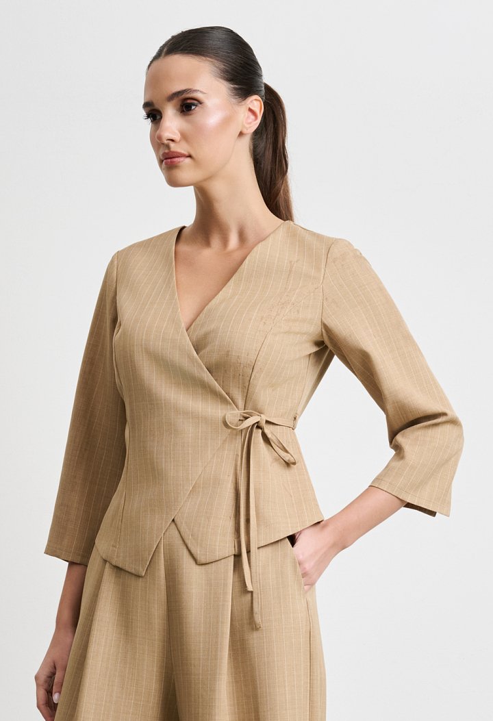 Beige top and trousers set