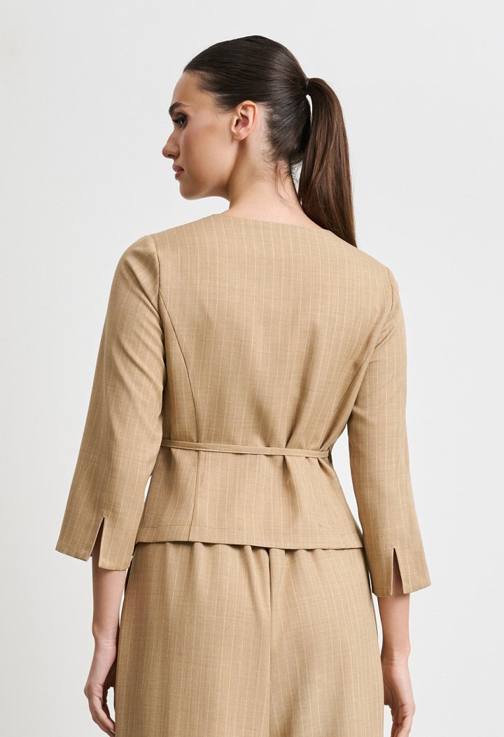Beige top and trousers set