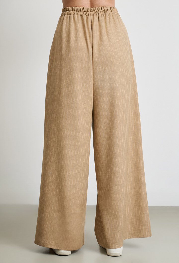 Beige top and trousers set